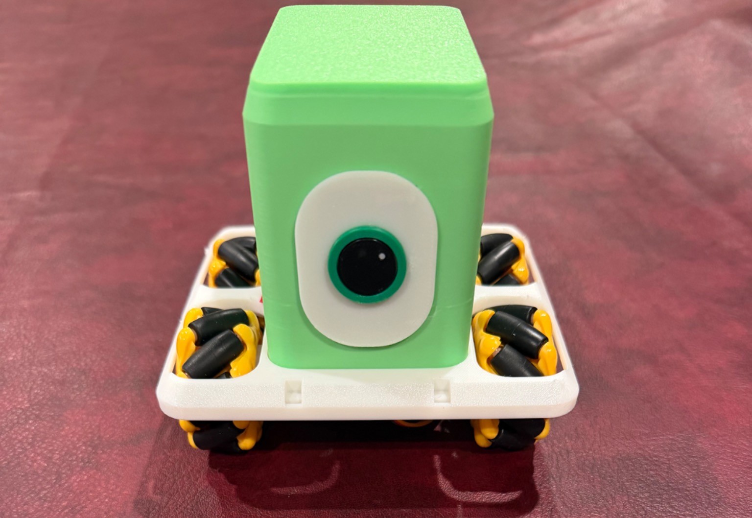 Four-wheel mecanum robot with custom character-inspired upper enclosure